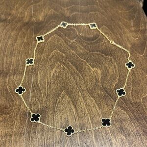 Elegant Gold and Black Clover Necklace